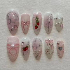 Cyflymder 24Pcs Pink Smudge Press on Fake Nails Mid-length Almond Reusable False Nail Bow Heart Rhinestone Pearl Full Cover Nails Tips Art