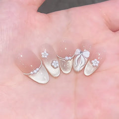 Cyflymder 24Pcs Pink Bowknots Simple Press on Nails Sweet Cool Cat's Eye False Nails French Style Almond Ballet Fake Nail Tips Detachable