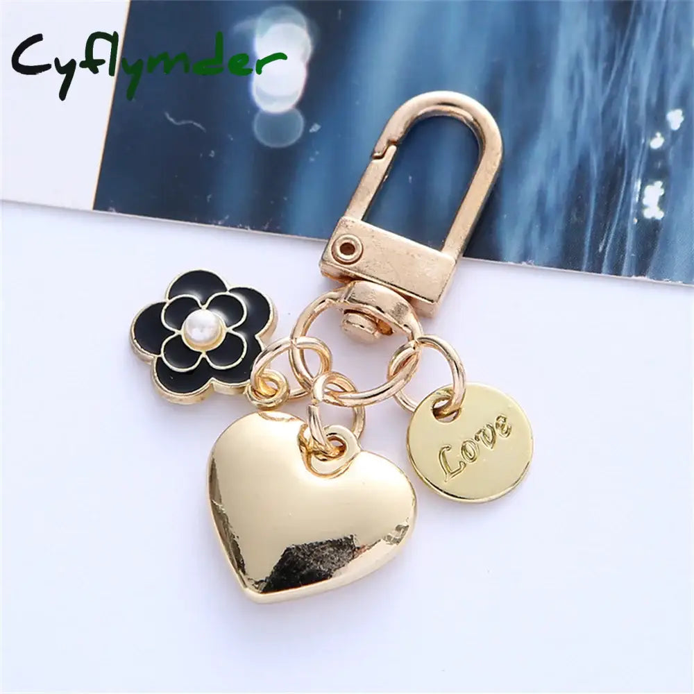 Cyflymder New Metal Heart Keychain Fashion Camellia Letters Round Pendant For Women Girls Headphone