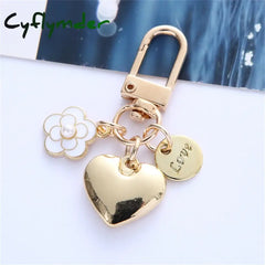 Cyflymder New Metal Heart Keychain Fashion Camellia Letters Round Pendant For Women Girls Headphone